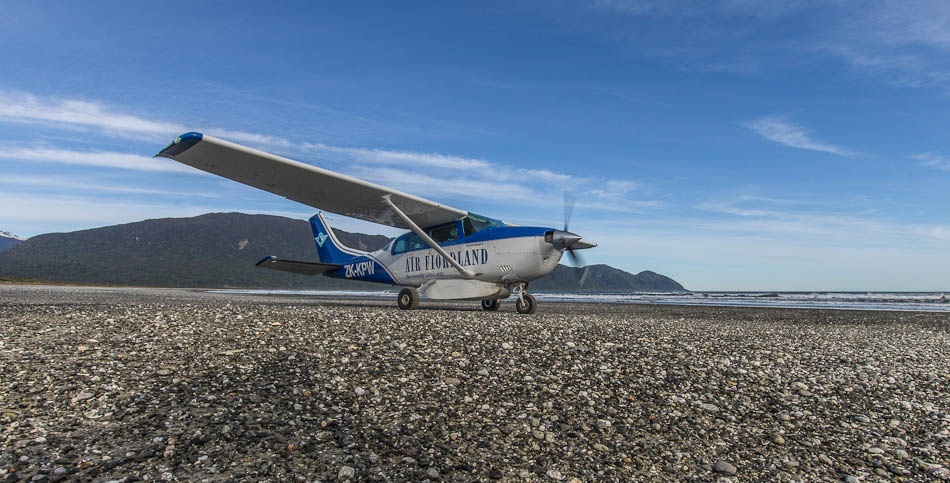 Cessna Stationair in Big Bay, Fiordland, New Zealand.