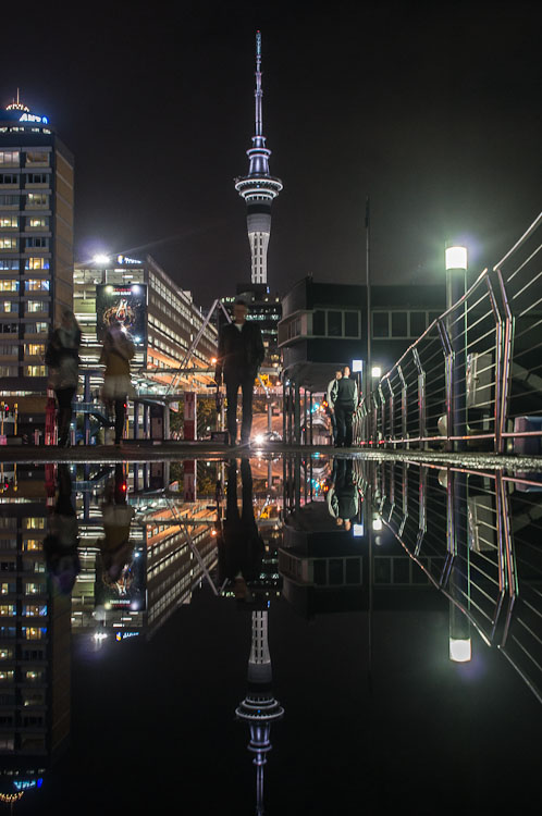 Reflection of Sky Tower at night, Auckland, New Zealand