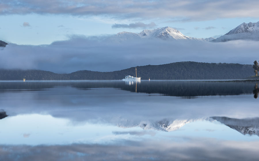 Reflection on Lake Te Anau, Fiordland, New Zealand