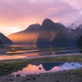 Sunset over Milford Sound & the last sunbeam, Fiordland, New... | photography